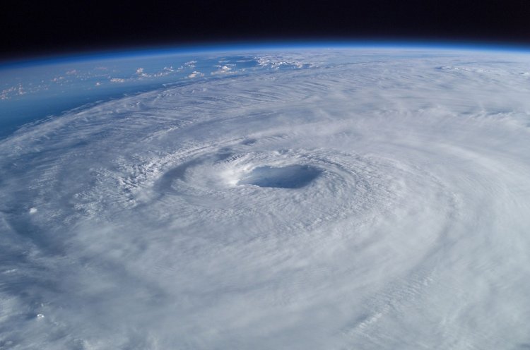 Hurricane Isabel in 2003 as seen from the International Space Station. The eye, eyewall, and surrounding rainbands, characteristics of tropical cyclones in the narrow sense, are clearly visible in this view from space