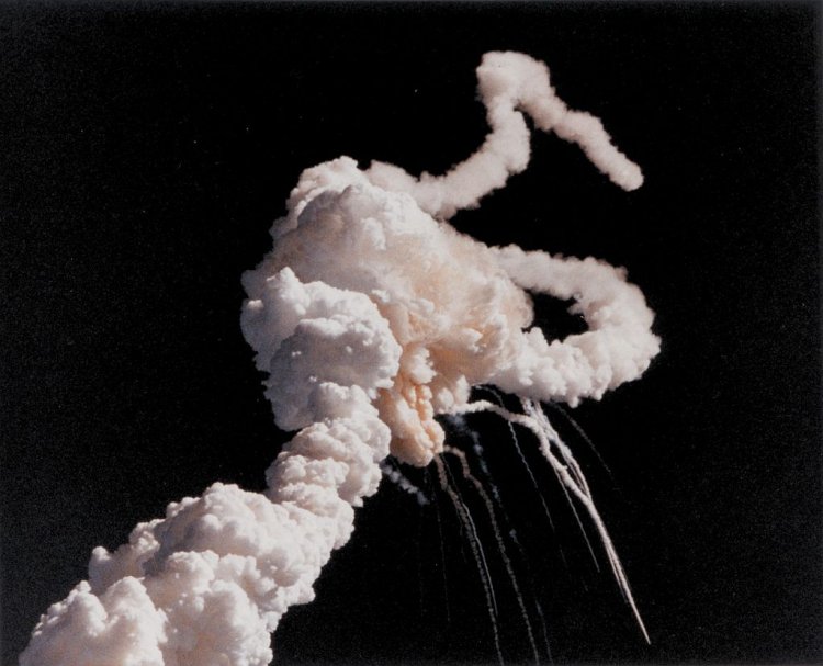 Space Shuttle Challenger explodes shortly after launch