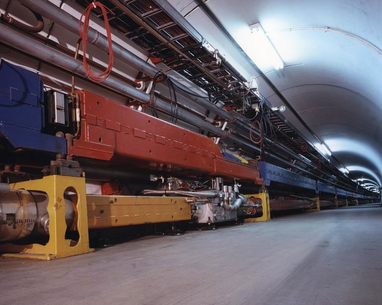 Two rings in the Tevatron tunnel: the initial one (above) and the superconducting one (below)